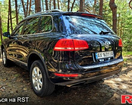 Черный Фольксваген Туарег, объемом двигателя 3 л и пробегом 350 тыс. км за 18500 $, фото 3 на Automoto.ua