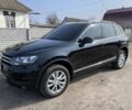 Черный Фольксваген Туарег, объемом двигателя 3 л и пробегом 340 тыс. км за 17500 $, фото 2 на Automoto.ua