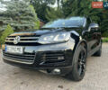 Черный Фольксваген Туарег, объемом двигателя 3 л и пробегом 310 тыс. км за 17500 $, фото 1 на Automoto.ua