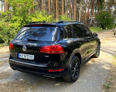 Чорний Фольксваген Туарег, об'ємом двигуна 3 л та пробігом 283 тис. км за 17999 $, фото 2 на Automoto.ua