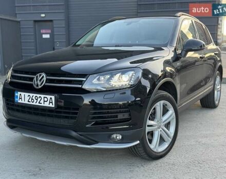 Чорний Фольксваген Туарег, об'ємом двигуна 3 л та пробігом 236 тис. км за 20750 $, фото 1 на Automoto.ua