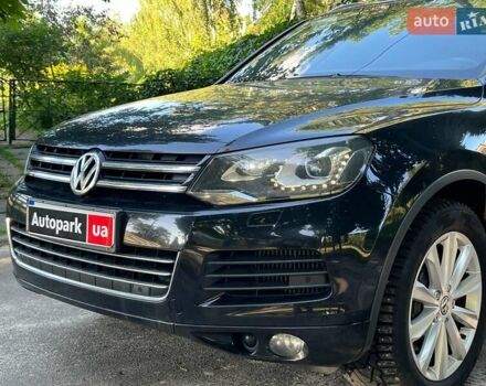 Чорний Фольксваген Туарег, об'ємом двигуна 4.2 л та пробігом 255 тис. км за 28440 $, фото 1 на Automoto.ua
