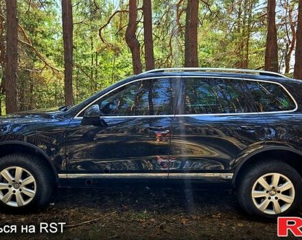 Черный Фольксваген Туарег, объемом двигателя 3 л и пробегом 350 тыс. км за 18500 $, фото 1 на Automoto.ua