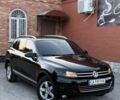 Чорний Фольксваген Туарег, об'ємом двигуна 3 л та пробігом 310 тис. км за 15500 $, фото 1 на Automoto.ua