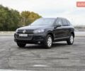 Черный Фольксваген Туарег, объемом двигателя 2.97 л и пробегом 275 тыс. км за 22000 $, фото 1 на Automoto.ua