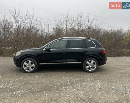 Черный Фольксваген Туарег, объемом двигателя 2.97 л и пробегом 350 тыс. км за 15799 $, фото 1 на Automoto.ua