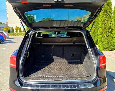 Черный Фольксваген Туарег, объемом двигателя 3 л и пробегом 240 тыс. км за 17800 $, фото 1 на Automoto.ua