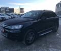 Черный Фольксваген Туарег, объемом двигателя 3 л и пробегом 225 тыс. км за 18490 $, фото 1 на Automoto.ua
