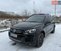 Черный Фольксваген Туарег, объемом двигателя 3 л и пробегом 285 тыс. км за 14000 $, фото 1 на Automoto.ua