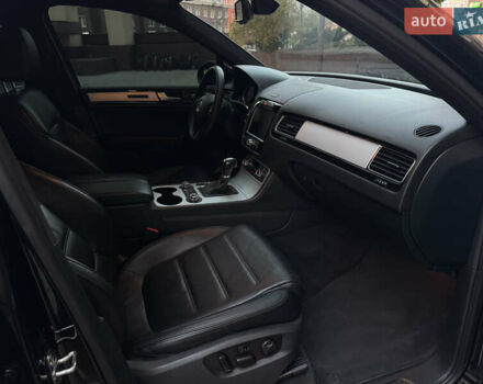 Черный Фольксваген Туарег, объемом двигателя 3 л и пробегом 250 тыс. км за 19000 $, фото 22 на Automoto.ua