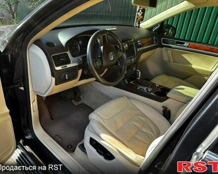 Черный Фольксваген Туарег, объемом двигателя 3 л и пробегом 200 тыс. км за 27000 $, фото 5 на Automoto.ua