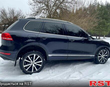 Черный Фольксваген Туарег, объемом двигателя 3 л и пробегом 258 тыс. км за 20600 $, фото 2 на Automoto.ua