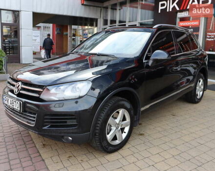 Черный Фольксваген Туарег, объемом двигателя 3 л и пробегом 284 тыс. км за 17800 $, фото 1 на Automoto.ua