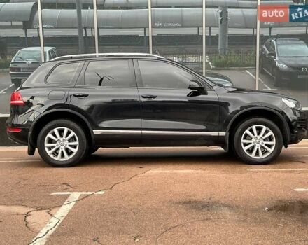 Чорний Фольксваген Туарег, об'ємом двигуна 3 л та пробігом 433 тис. км за 16700 $, фото 4 на Automoto.ua