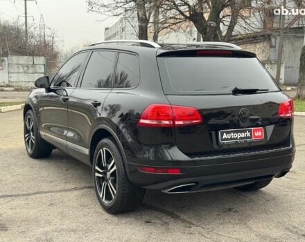 Черный Фольксваген Туарег, объемом двигателя 3 л и пробегом 308 тыс. км за 16490 $, фото 4 на Automoto.ua
