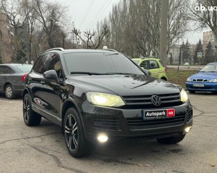 Черный Фольксваген Туарег, объемом двигателя 3 л и пробегом 308 тыс. км за 16490 $, фото 2 на Automoto.ua