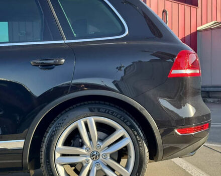 Чорний Фольксваген Туарег, об'ємом двигуна 3 л та пробігом 91 тис. км за 29900 $, фото 1 на Automoto.ua