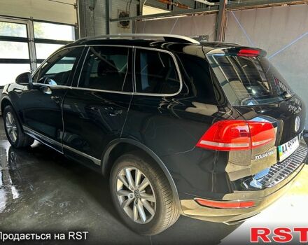 Чорний Фольксваген Туарег, об'ємом двигуна 3 л та пробігом 242 тис. км за 18750 $, фото 4 на Automoto.ua
