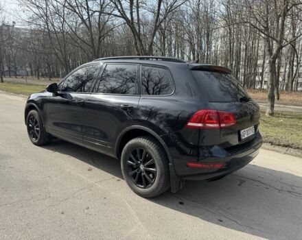 Чорний Фольксваген Туарег, об'ємом двигуна 3 л та пробігом 307 тис. км за 17000 $, фото 4 на Automoto.ua