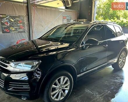 Чорний Фольксваген Туарег, об'ємом двигуна 3 л та пробігом 242 тис. км за 18750 $, фото 1 на Automoto.ua