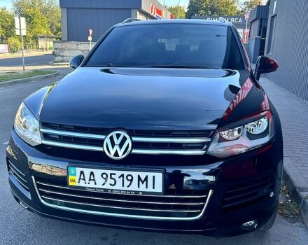 Чорний Фольксваген Туарег, об'ємом двигуна 3 л та пробігом 242 тис. км за 18750 $, фото 1 на Automoto.ua