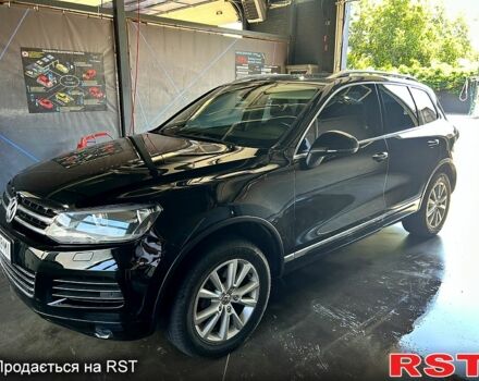 Чорний Фольксваген Туарег, об'ємом двигуна 3 л та пробігом 242 тис. км за 18750 $, фото 2 на Automoto.ua