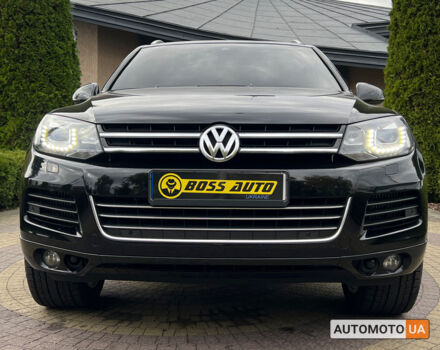 Черный Фольксваген Туарег, объемом двигателя 3 л и пробегом 251 тыс. км за 24700 $, фото 1 на Automoto.ua