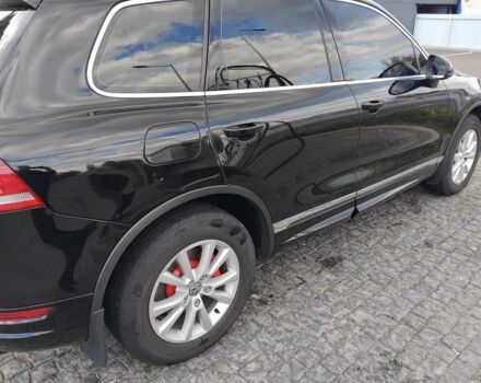 Чорний Фольксваген Туарег, об'ємом двигуна 3 л та пробігом 290 тис. км за 16300 $, фото 4 на Automoto.ua