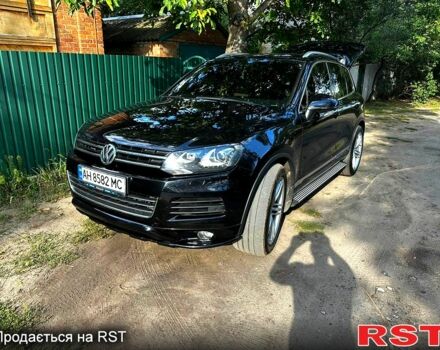 Черный Фольксваген Туарег, объемом двигателя 3 л и пробегом 200 тыс. км за 27000 $, фото 1 на Automoto.ua