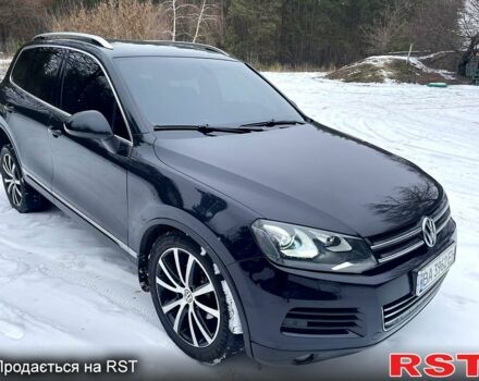 Черный Фольксваген Туарег, объемом двигателя 3 л и пробегом 258 тыс. км за 20600 $, фото 1 на Automoto.ua