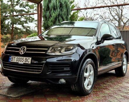 Черный Фольксваген Туарег, объемом двигателя 3 л и пробегом 250 тыс. км за 17300 $, фото 1 на Automoto.ua