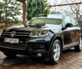Черный Фольксваген Туарег, объемом двигателя 3 л и пробегом 250 тыс. км за 17300 $, фото 1 на Automoto.ua