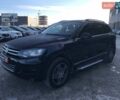 Чорний Фольксваген Туарег, об'ємом двигуна 3 л та пробігом 225 тис. км за 18490 $, фото 1 на Automoto.ua