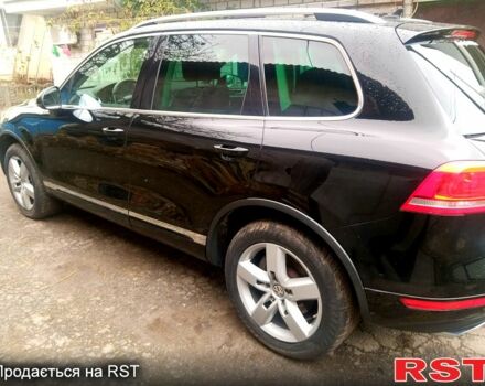 Чорний Фольксваген Туарег, об'ємом двигуна 3 л та пробігом 360 тис. км за 17300 $, фото 1 на Automoto.ua