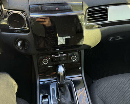 Черный Фольксваген Туарег, объемом двигателя 2.97 л и пробегом 305 тыс. км за 16450 $, фото 1 на Automoto.ua