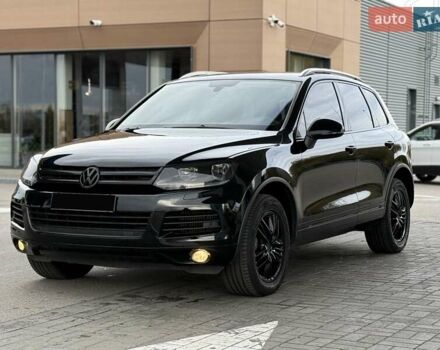 Черный Фольксваген Туарег, объемом двигателя 3 л и пробегом 207 тыс. км за 15700 $, фото 1 на Automoto.ua