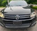 Чорний Фольксваген Туарег, об'ємом двигуна 3 л та пробігом 150 тис. км за 7000 $, фото 1 на Automoto.ua
