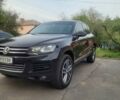 Черный Фольксваген Туарег, объемом двигателя 2.97 л и пробегом 402 тыс. км за 20000 $, фото 1 на Automoto.ua