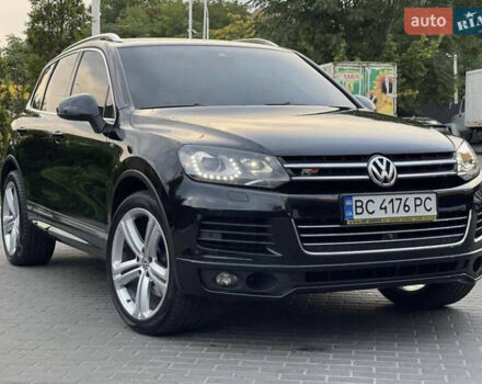 Чорний Фольксваген Туарег, об'ємом двигуна 4.13 л та пробігом 215 тис. км за 25000 $, фото 4 на Automoto.ua