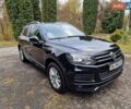 Черный Фольксваген Туарег, объемом двигателя 3 л и пробегом 209 тыс. км за 24999 $, фото 1 на Automoto.ua