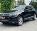 Чорний Фольксваген Туарег, об'ємом двигуна 3 л та пробігом 197 тис. км за 27490 $, фото 1 на Automoto.ua