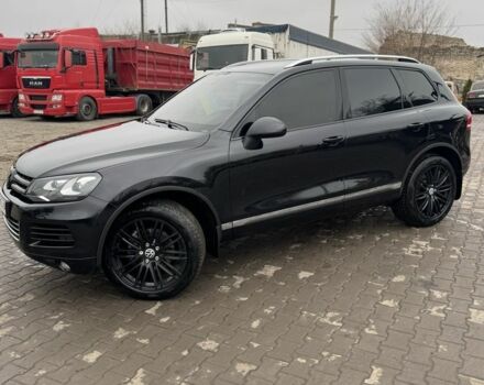Черный Фольксваген Туарег, объемом двигателя 2.97 л и пробегом 157 тыс. км за 24500 $, фото 1 на Automoto.ua