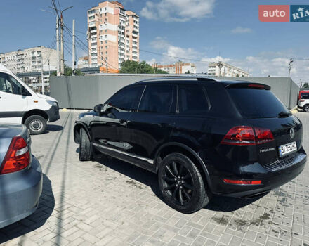 Чорний Фольксваген Туарег, об'ємом двигуна 2.97 л та пробігом 309 тис. км за 19500 $, фото 1 на Automoto.ua
