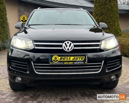 Чорний Фольксваген Туарег, об'ємом двигуна 3 л та пробігом 191 тис. км за 25300 $, фото 1 на Automoto.ua