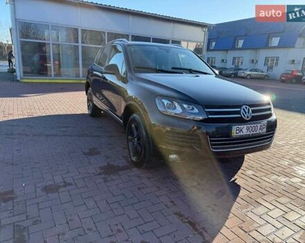 Черный Фольксваген Туарег, объемом двигателя 2.97 л и пробегом 298 тыс. км за 20799 $, фото 1 на Automoto.ua