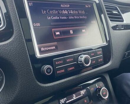 Черный Фольксваген Туарег, объемом двигателя 2.97 л и пробегом 348 тыс. км за 19500 $, фото 58 на Automoto.ua