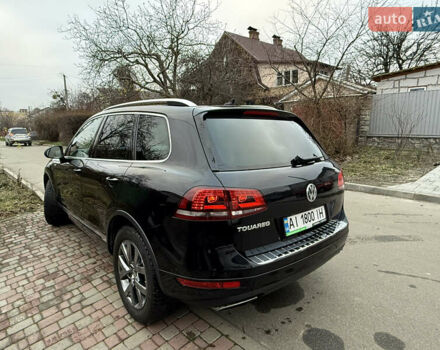 Чорний Фольксваген Туарег, об'ємом двигуна 4.13 л та пробігом 258 тис. км за 28500 $, фото 1 на Automoto.ua