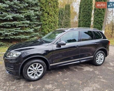 Черный Фольксваген Туарег, объемом двигателя 3 л и пробегом 209 тыс. км за 24999 $, фото 2 на Automoto.ua