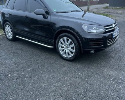 Черный Фольксваген Туарег, объемом двигателя 2.97 л и пробегом 201 тыс. км за 16500 $, фото 1 на Automoto.ua