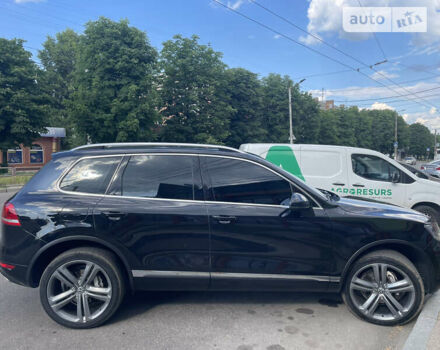 Черный Фольксваген Туарег, объемом двигателя 2.97 л и пробегом 320 тыс. км за 21000 $, фото 1 на Automoto.ua